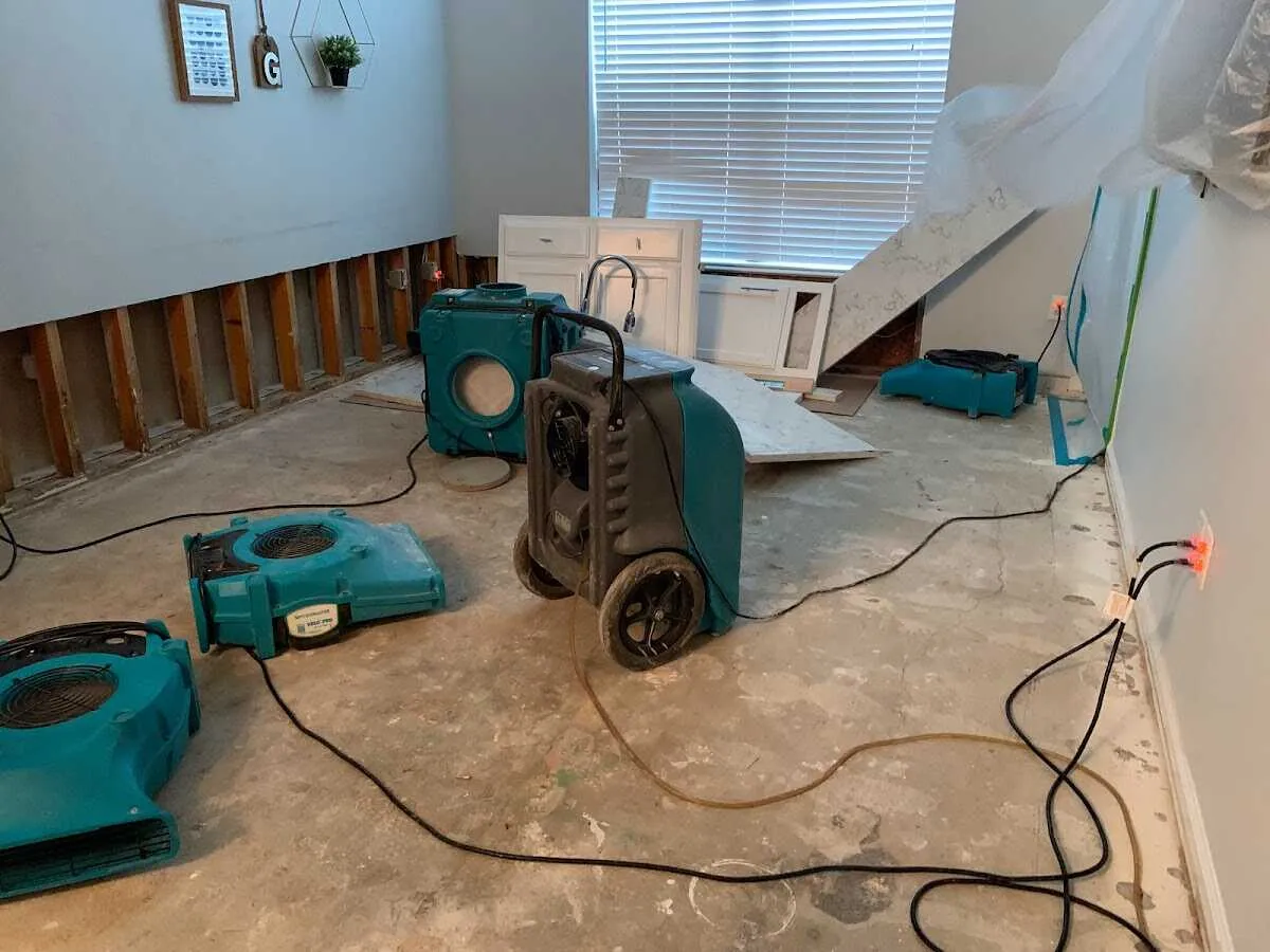Dehumidifier in flood-cut room for Water Damage Restoration in Waterford